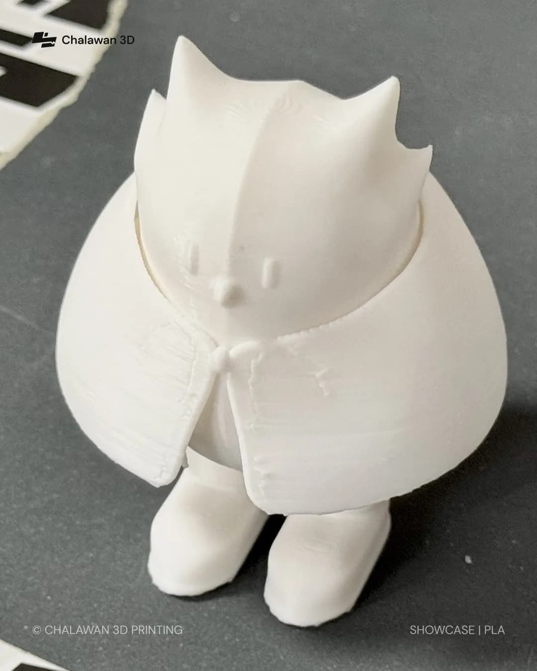 Caped Cat Figure